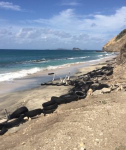 on our cycling tour in Carriacou - the east coast here protected from erosion with tyres